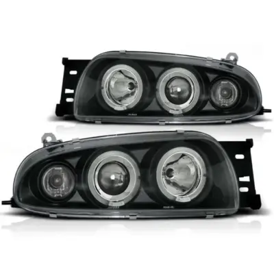 Fari Tuning con Anelli Alogeni Anteriori Dx e Sx per Ford Fiesta MK4 1995-1999
